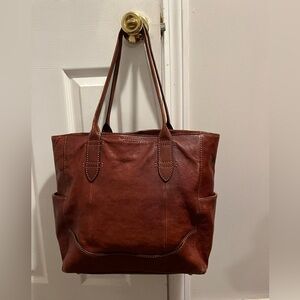 Frye 13 inch bag. Cognac color. Barely used. Bought new!